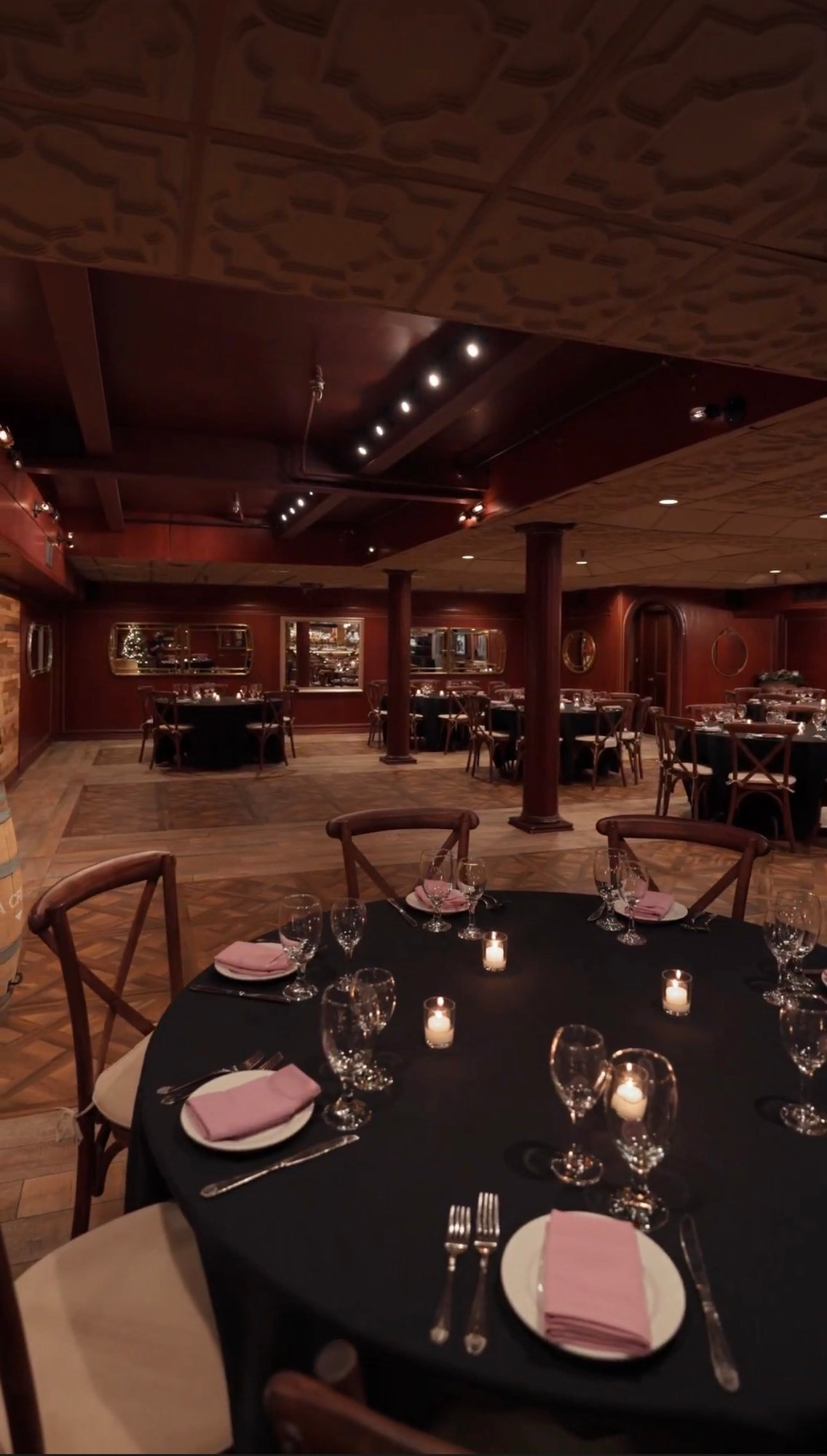 The Tosca Room set with round tables for a celebration